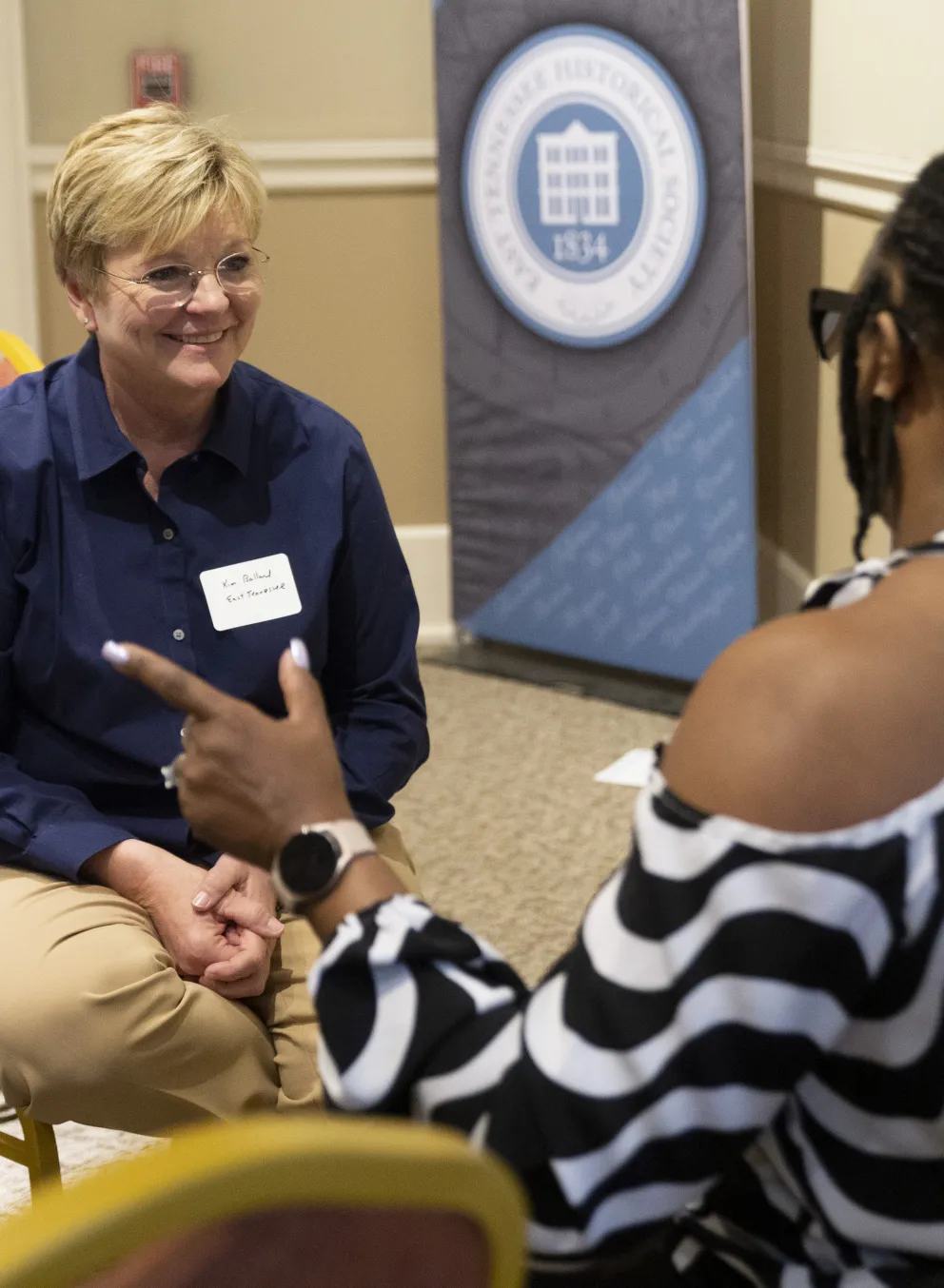 Two YMCA staff have a conversation